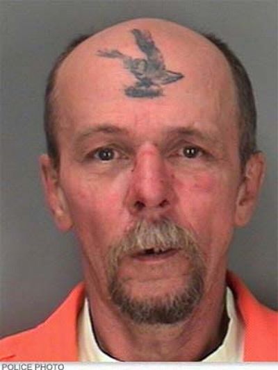 15 insane mugshot tattoos (15 pics)